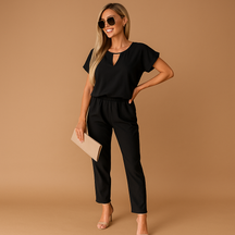 Zwarte jumpsuit dames met getailleerde pasvorm voor feesten | Milou 1