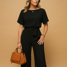 https://cdn.shopify.com/s/files/1/0910/7918/0552/files/elegante-dames-jumpsuit-met-getailleerd-ontwerp-en-losvallende-mouwen3.png?v=1745782507