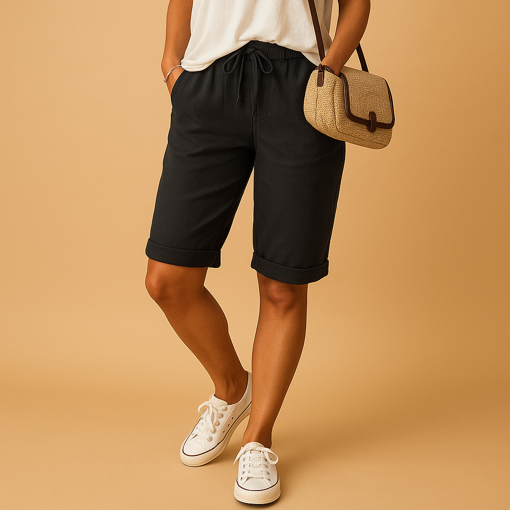https://cdn.shopify.com/s/files/1/0910/7918/0552/files/luchtige-capribroek-met-elastische-taille-voor-dames4.png?v=1746912346